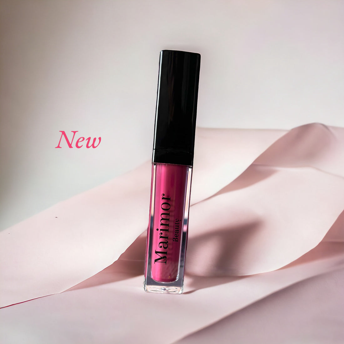 Purple pink lipstick shade on woman's lips with Marimor Beauty logo in background.